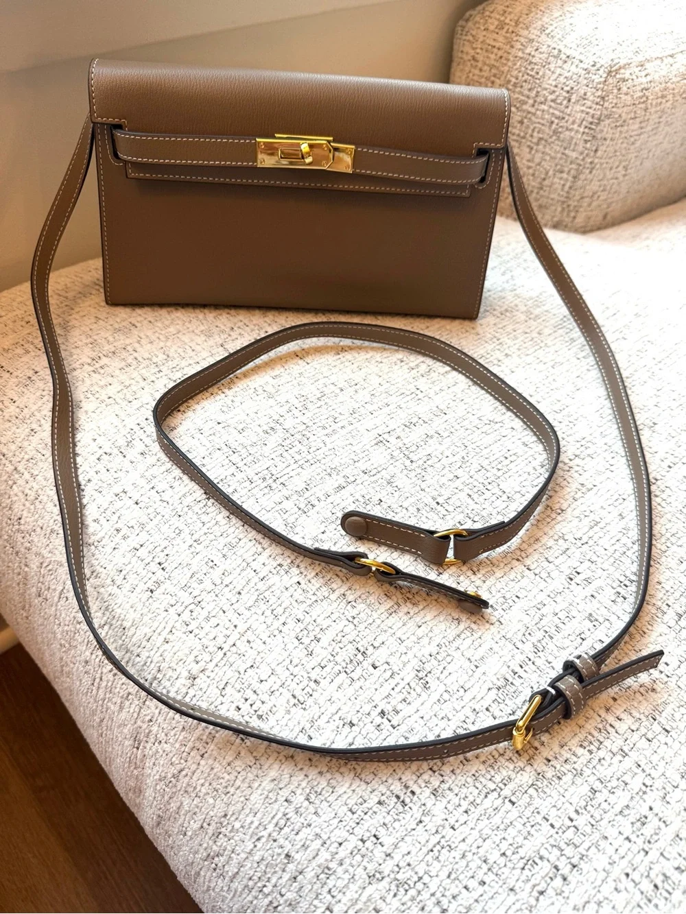 Sleek Taupe Leather Wristlet Clutch with Gold-Tone Hardware